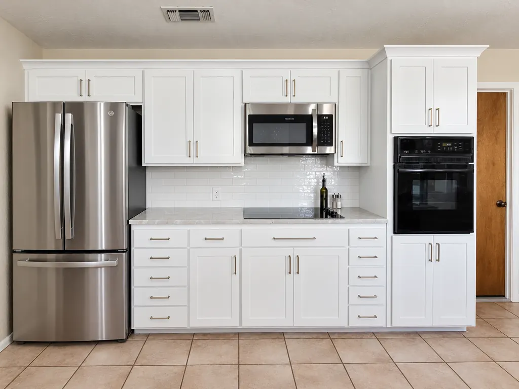 Country kitchen after cabinet refacing